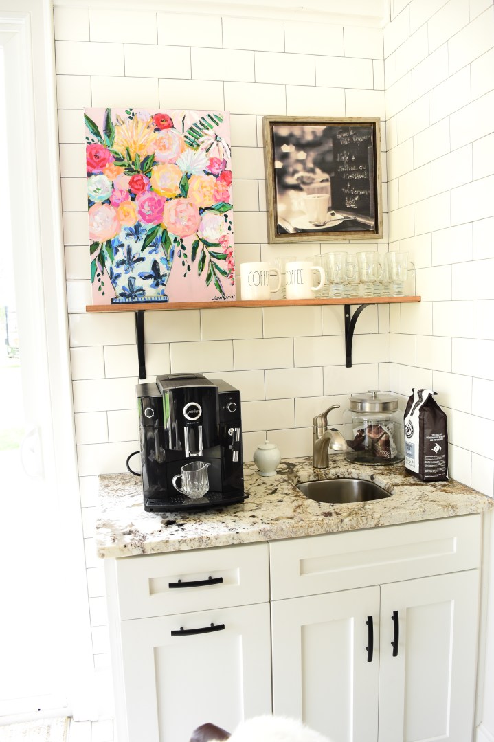 blush pink floral painting in blue and white ginger jar